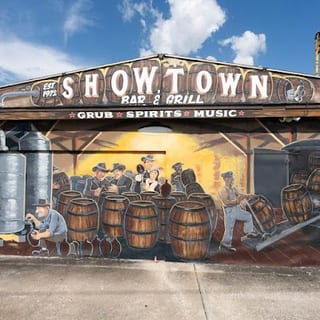 (b) Showtown Usa